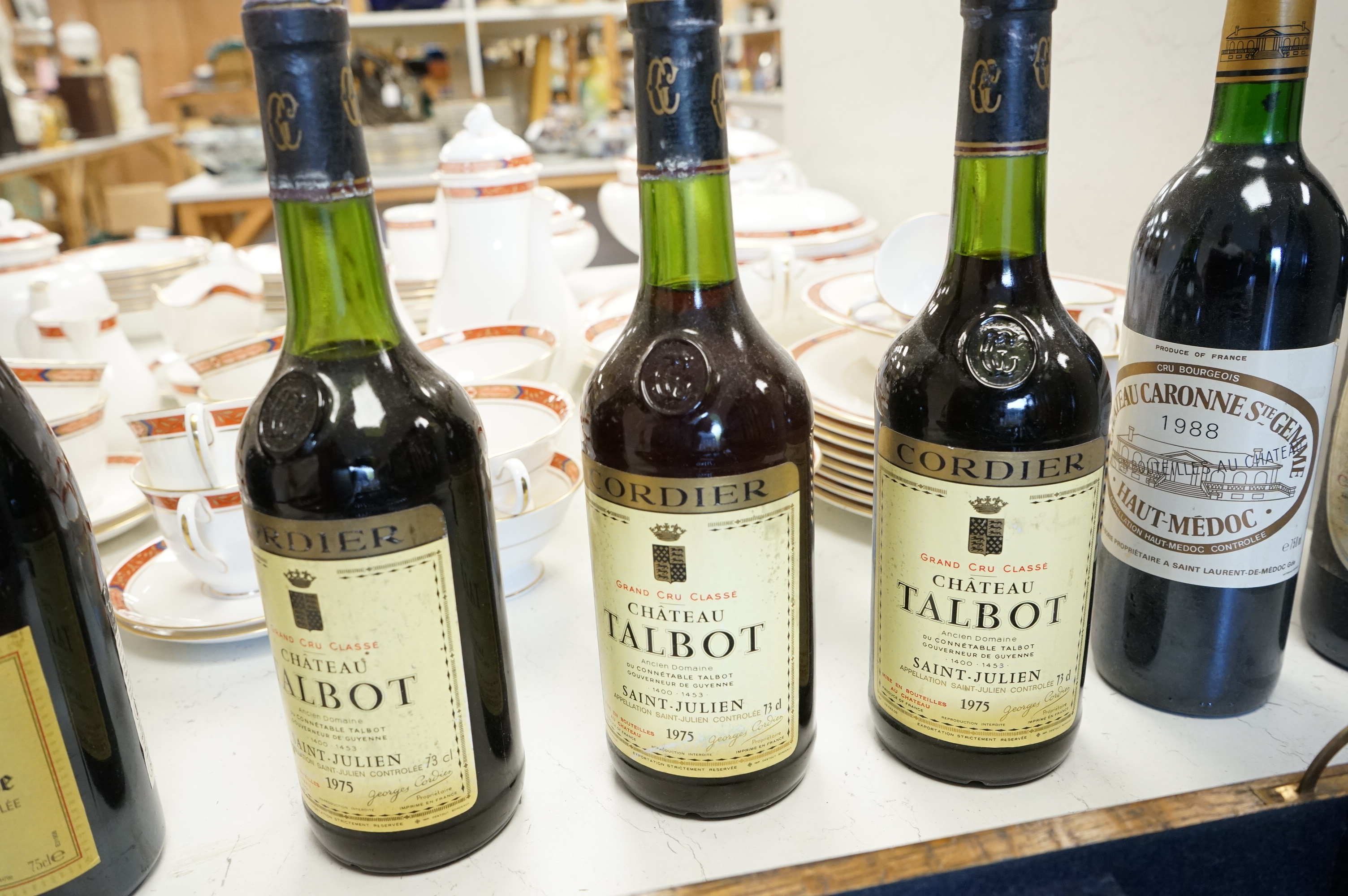 Eight bottles of red wine including three bottles of Chateau Talbot Saint Julien 1975, Chateauneuf du Pape 2008, Chateau Caronne Ste Gemme 1988 etc.